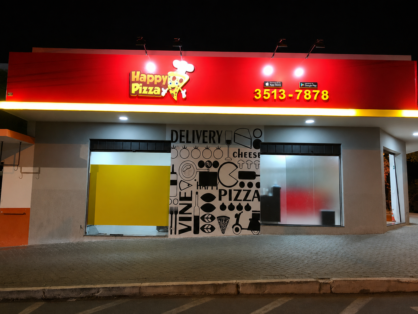 Fachada lateral da Happy Pizza em Araguari